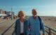 Couple Walking Along Hastings Promenade